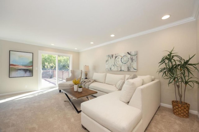 carpeted living room featuring ornamental molding