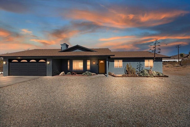 view of front of house with a garage