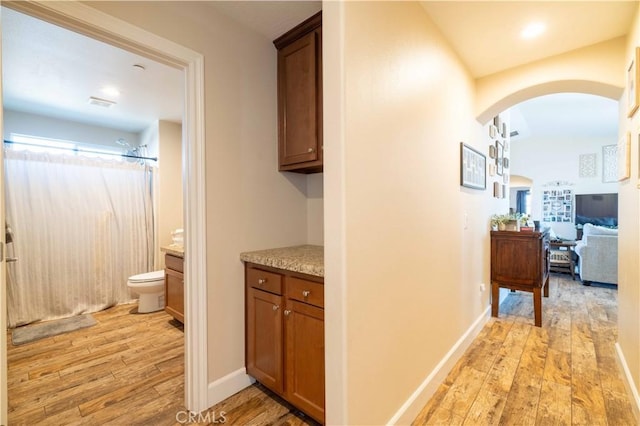 hallway featuring light hardwood / wood-style floors