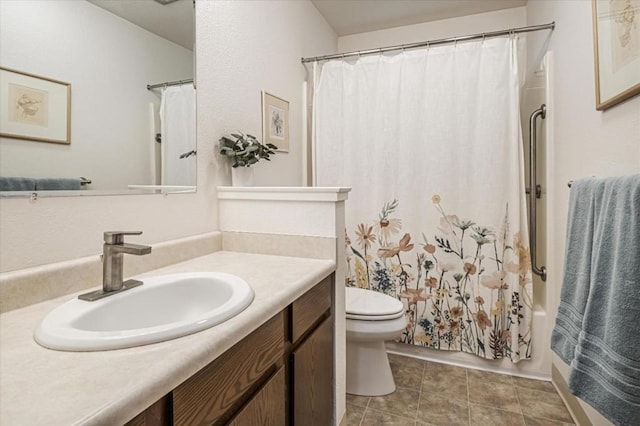 full bathroom with vanity, toilet, tile patterned flooring, and shower / tub combo