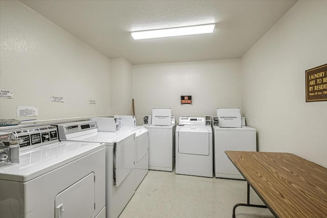 laundry room featuring independent washer and dryer