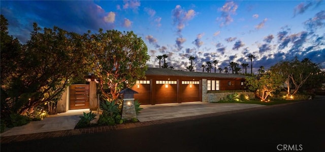 view of front of property featuring a garage