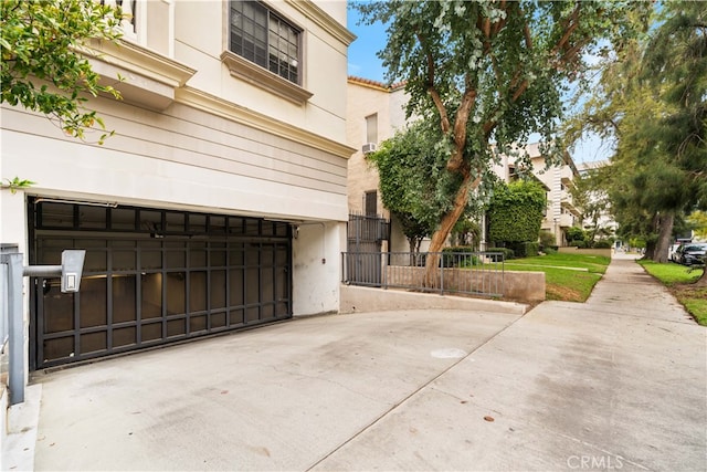 exterior space with a garage