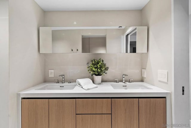 bathroom with vanity and backsplash