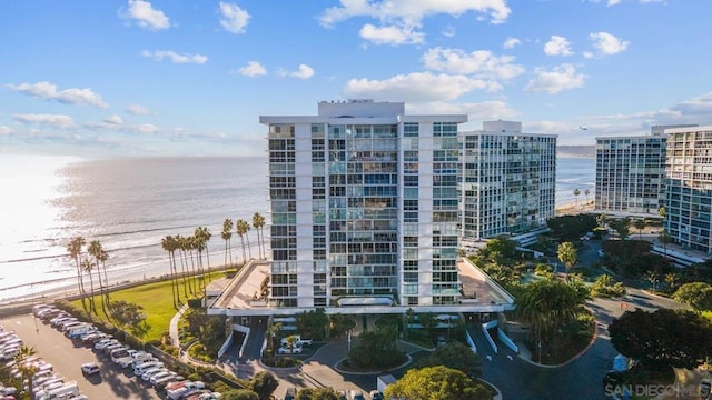 view of building exterior with a water view