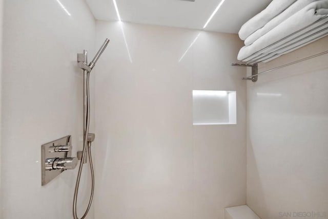 interior space featuring walk in shower