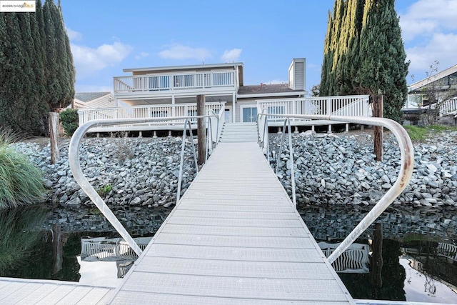 dock area with a balcony