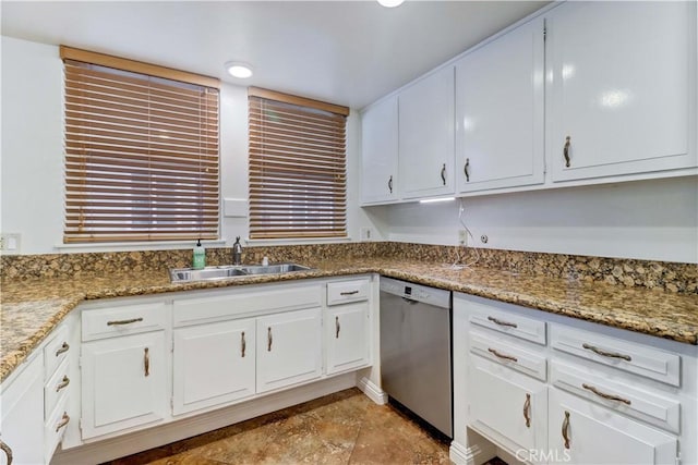 kitchen featuring white cabinetry, sink, dishwasher, and stone countertops