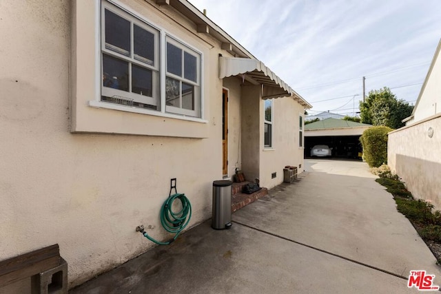 view of property exterior with a garage