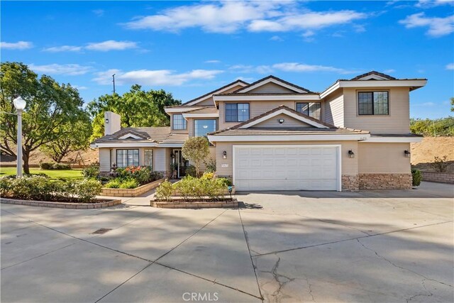 front of property with a garage