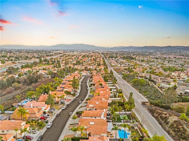 aerial view at dusk with a mountain view