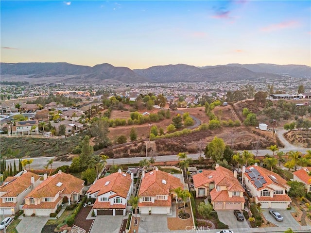 aerial view at dusk with a mountain view