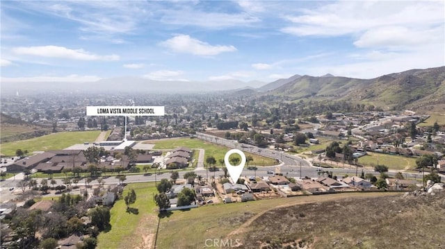 drone / aerial view with a residential view and a mountain view