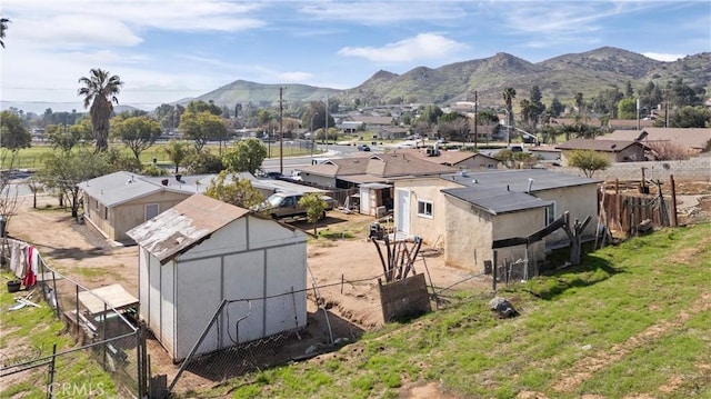 exterior space with a residential view and a mountain view