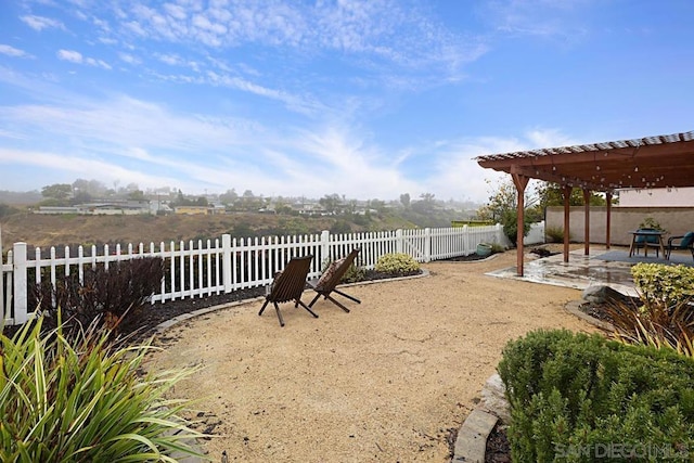 view of yard featuring a patio and a pergola