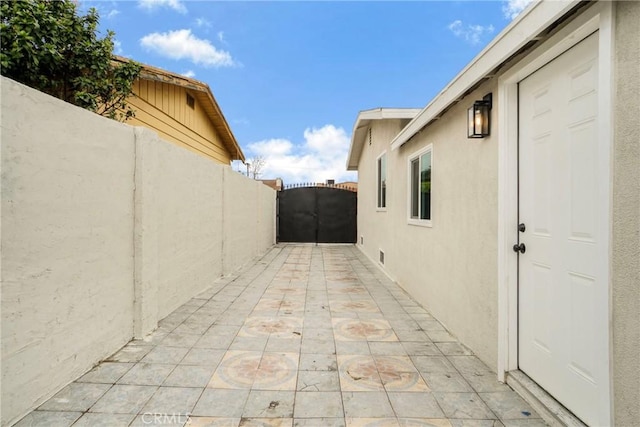 view of side of home featuring a patio