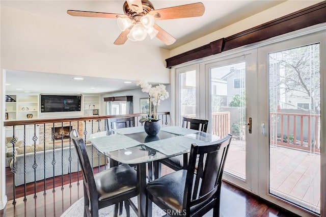 dining room with hardwood / wood-style flooring and french doors