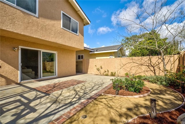 exterior space with a patio area