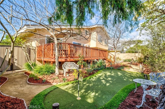 view of yard featuring a deck