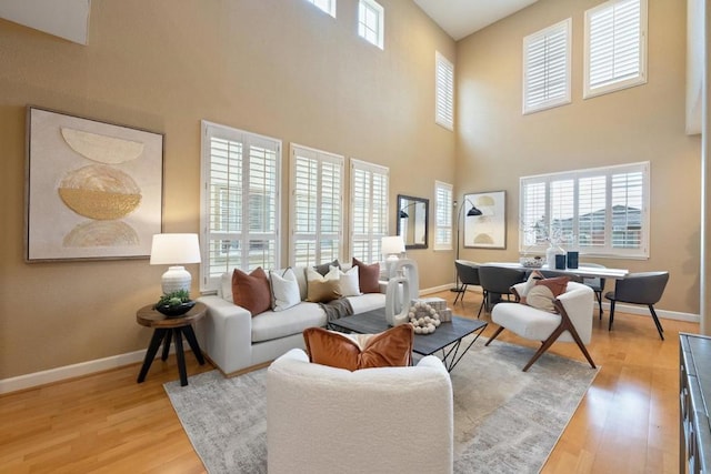 living room with light hardwood / wood-style flooring