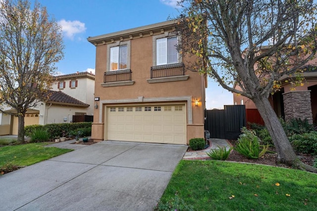 view of front of property with a garage and a front yard