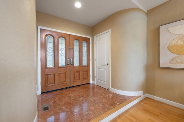 entryway featuring wood-type flooring