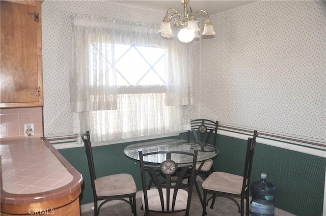 dining room featuring a chandelier