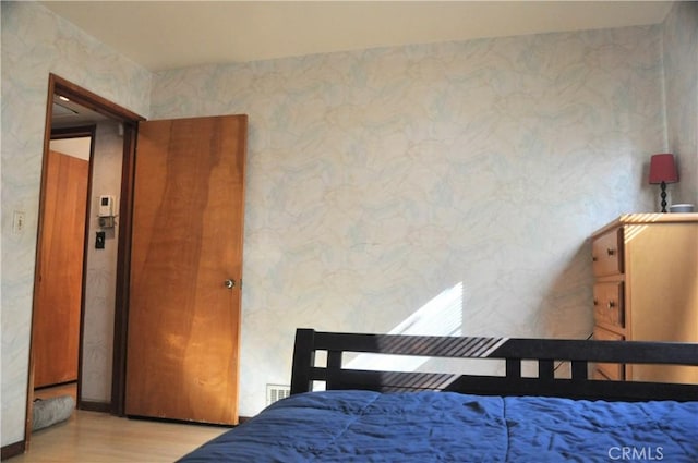 bedroom featuring light hardwood / wood-style flooring