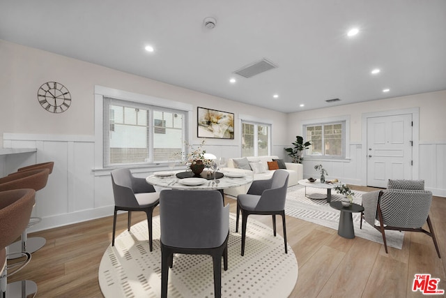 dining room with light wood-type flooring