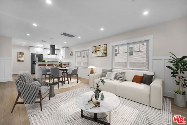 living room featuring light hardwood / wood-style floors