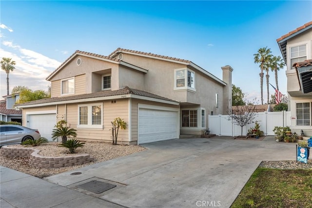 front of property with a garage