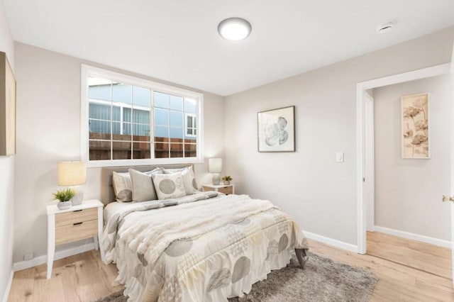 bedroom featuring light wood-type flooring