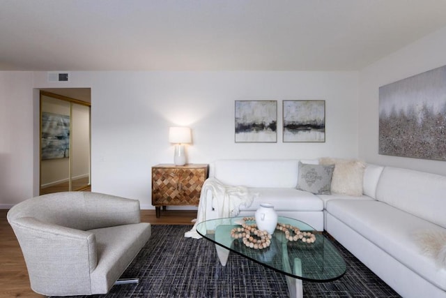 living room featuring dark hardwood / wood-style floors