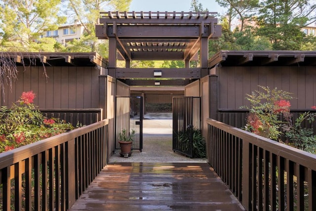 wooden deck featuring a pergola