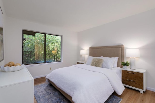 bedroom featuring hardwood / wood-style floors