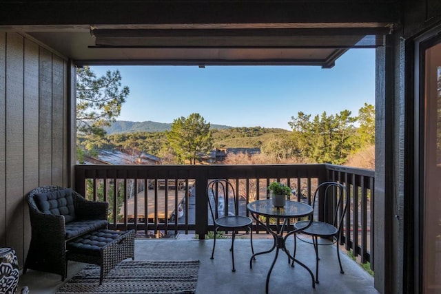 balcony featuring a mountain view