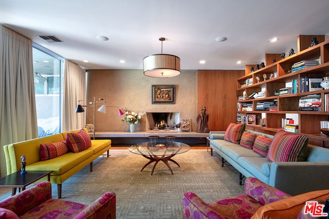 living room featuring a fireplace