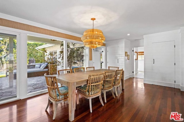 dining space featuring dark wood-type flooring