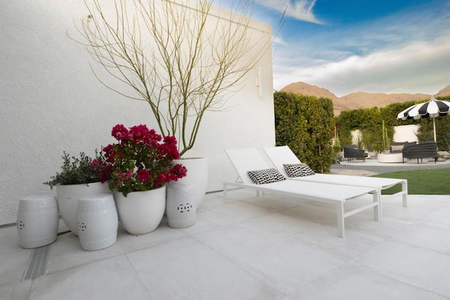 view of patio with a mountain view