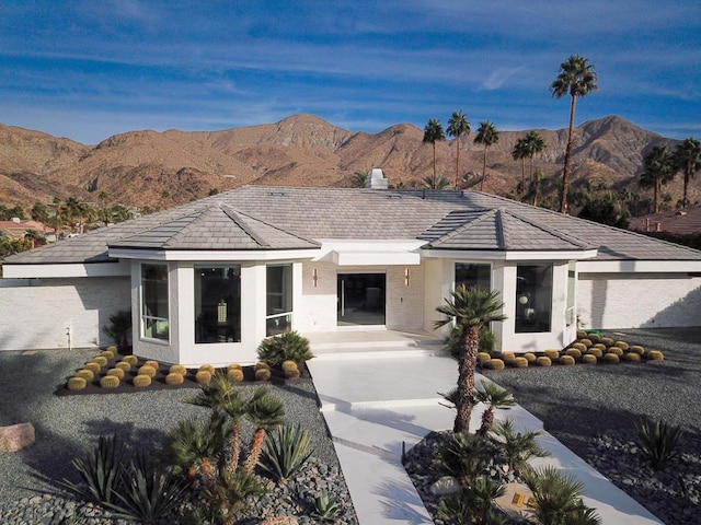 view of front facade featuring a mountain view