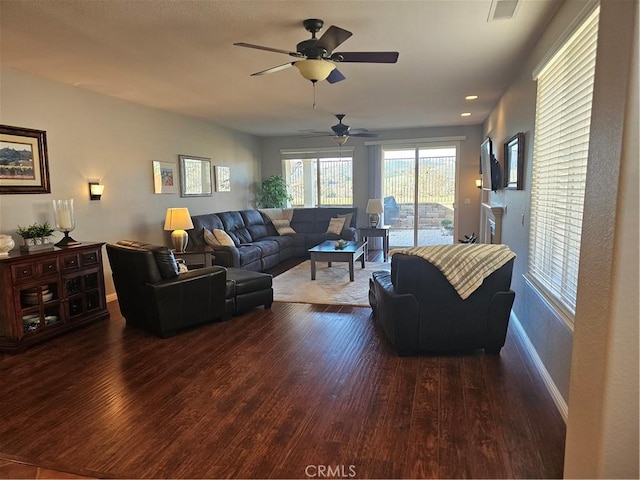 living room featuring dark wood-type flooring