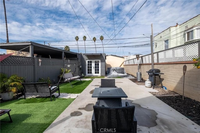 view of patio featuring area for grilling, an outdoor living space, and an outbuilding