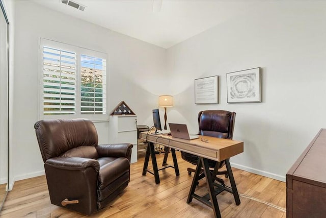 home office featuring light hardwood / wood-style flooring