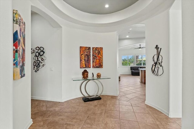 hallway with light tile patterned floors