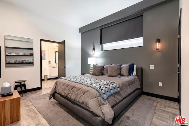 bedroom with light wood-type flooring