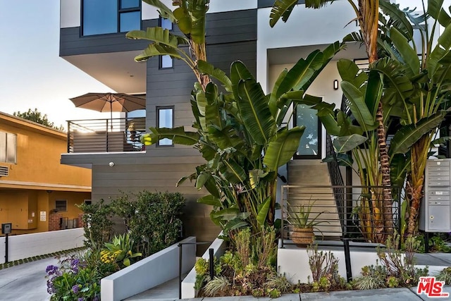 view of home's exterior featuring a balcony