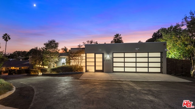 modern home featuring a garage