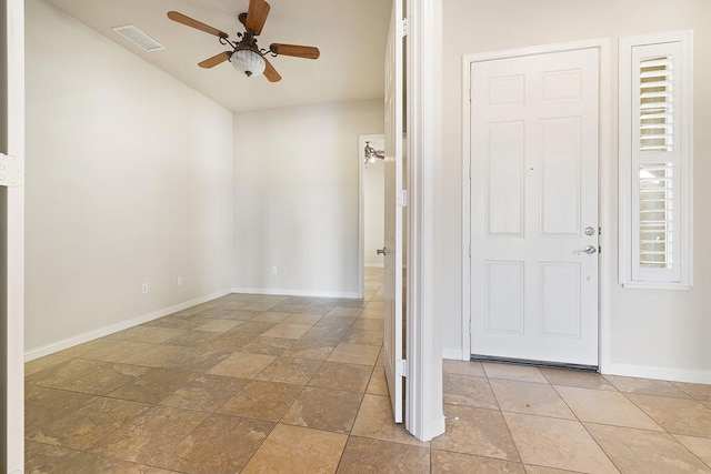 entrance foyer with ceiling fan