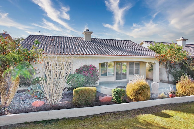 view of front of home with a patio area