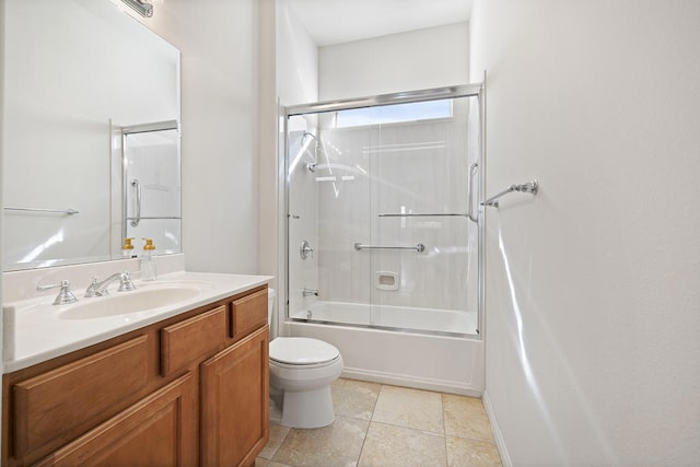 full bathroom featuring vanity, tile patterned floors, enclosed tub / shower combo, and toilet